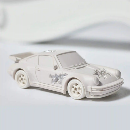 Hot Wheels x Daniel Arsham Eroded Porsche 930 and Rally Case
